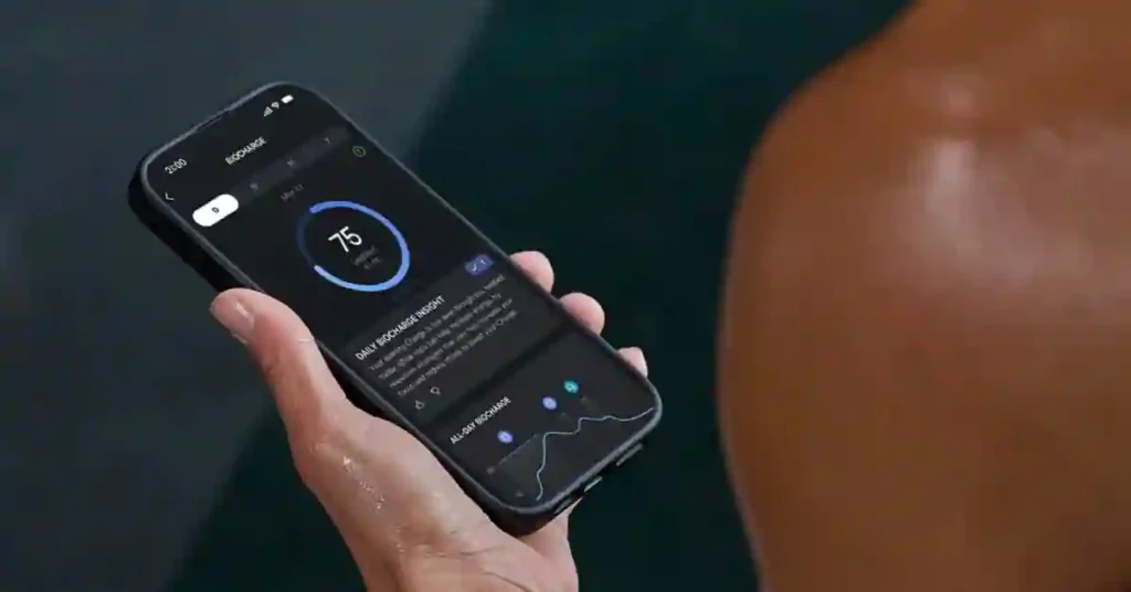 A close-up of the Amazfit Helio Strap on a wrist, with the display showing the "BioCharge Energy" metric at 85% and "Recovery Status: Excellent."