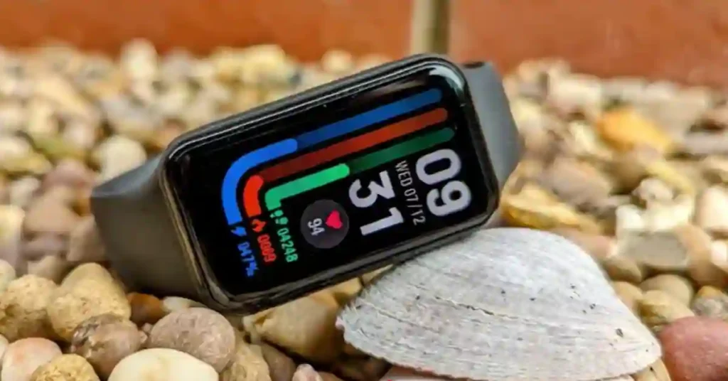 Comparison of Amazfit Bip 6 smartwatch and Amazfit Band 7 fitness tracker showing screen size difference.