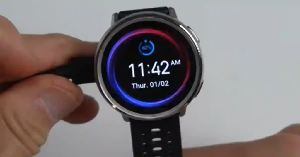 Amazfit Active 2 review - smartwatch placed on magnetic charger showing battery percentage